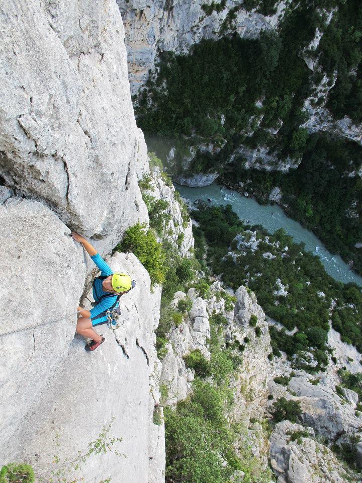 Georgia climbing above the river on a 9 pitch route.